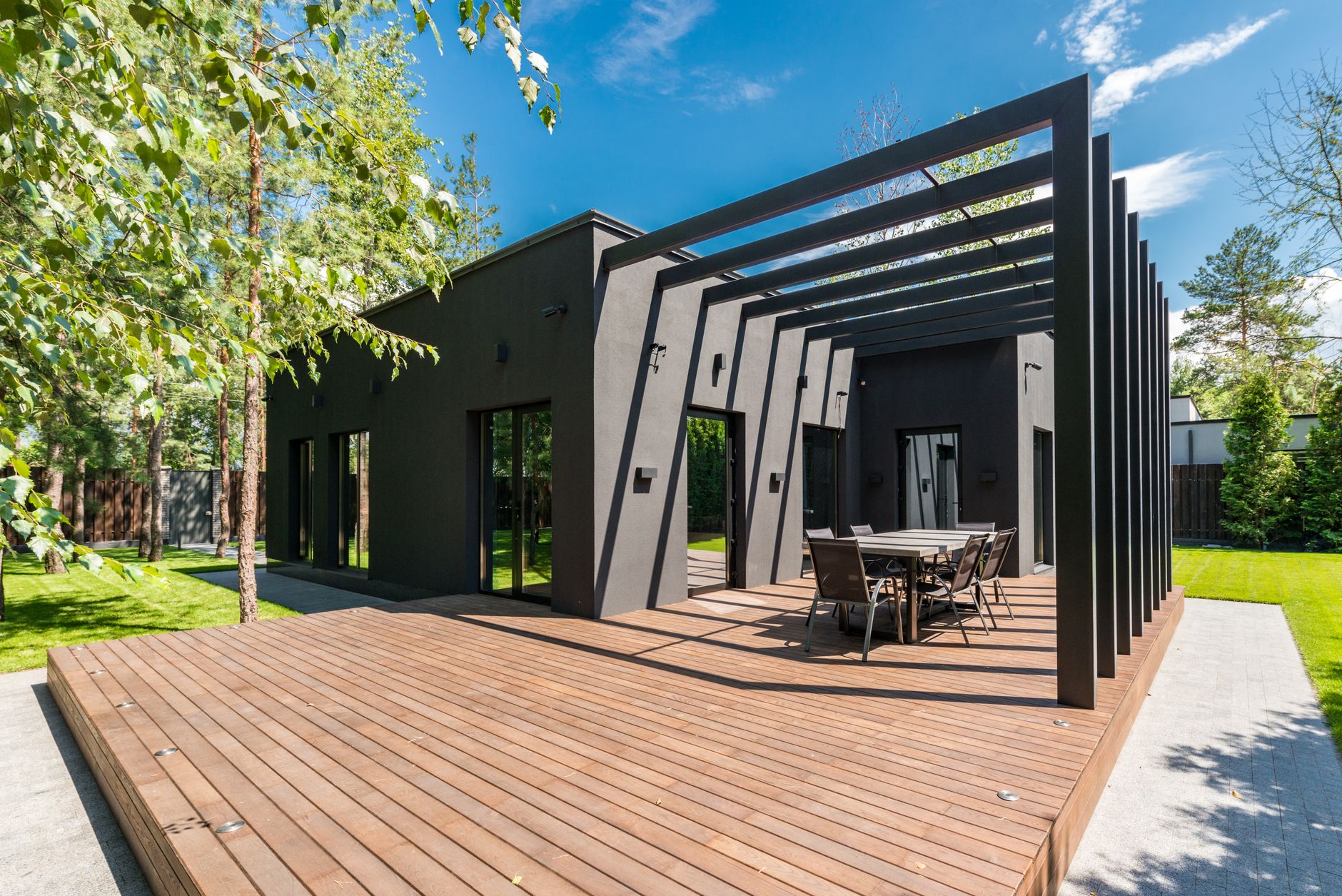A timber deck with a slatted screen